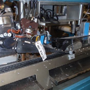 Avery#RC-17, horizontal wrap around labeler, rated up to 350 per minute, serial #403114, #33131