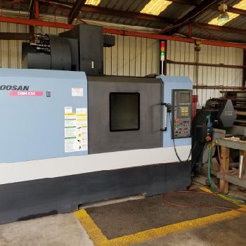 Doosan #DNM650, 50" X,26 Y,24 Z,12k RPM,20 SMTC,CT40,51x26,Fanuc i,R/T,4th table,’10