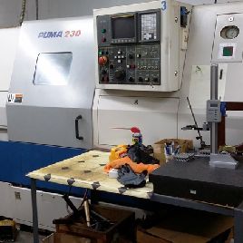 Daewoo #PUMA-230C, Fanuc 21iT,20x22.8",4k RPM,3 bar,25 HP,10 chuck,10 tool,tailstock,’01