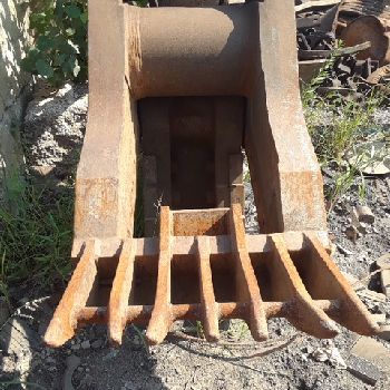 Genesis#GRS-70, rebar shear,10 identical 4-way indexable cutting blades,2 identical 2-way indexing piercing tips,used,2012