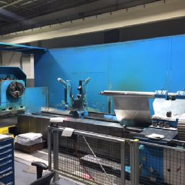 Tacchi#HD/3-105, gap bed, Fanuc O-TB, 59.1" swing, 24 chuck, 720 RPM, 45 diameter turning, 6.1 bar, chip conveyor,steady rest,1993