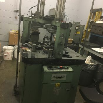 Cleveland#600VSD, 24" table,4 pneumatic pressure cylinders,rings,tooling,nice,s/n 2050