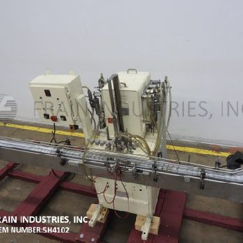 Filamatic#DAB-16-4, automatic,inline,8-head piston filler,with 3-1/4" W x 112 L Delrin conveyor,on heavy duty base frame