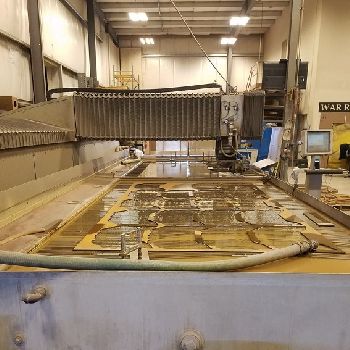 Flow#IFB, 6â€™ x 24â€™, CNC water jet cutting, dynamic cutting head, 87000 psi, 50 HP, 2009