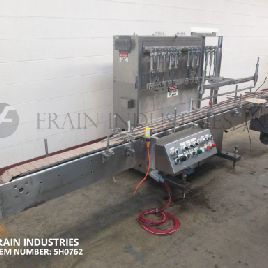 Filamatic#CVK-500, 12 head, high speed inline, automatic piston filler for free flowing, semi viscous and viscous products