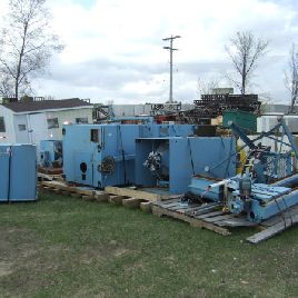 Progressive#1555, semi-automated pressure grit blast,72" gun mover,48 spindle,2004 (2 available)