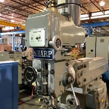 Sharp#VH25, plain horizontal/vertical miller,10.5" x 56.5 T-slotted table,4 HP,2005