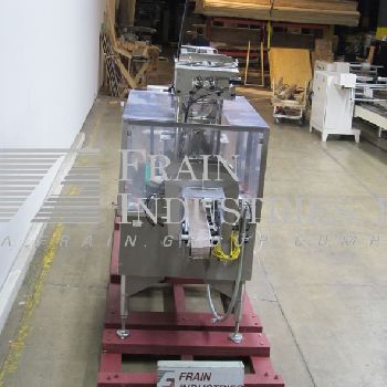 IWKA/ Oystar #PH-41P, automatic,Stainless Steel,inline overlidder rated from 60-200 lids/min.,4-1/2" wide x 175 long conveyor