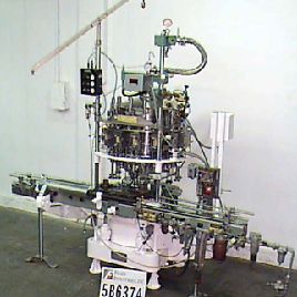 Horix # HBY15-RH, completamente automático, llenado por presión de gravedad líquida, hasta 150 CPM, sensores de nivel, llenado de abajo hacia arriba