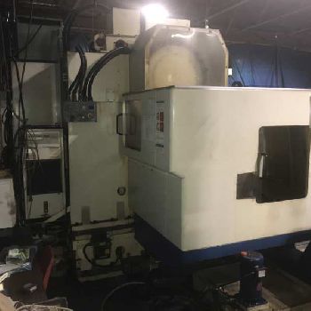 Daewoo #DMV-500, CNC VMC,24 ATC,40" X,20 Y,20 Z,CAT 40,Fanuc 21-M,turbo conveyor,S/N AV5S0594