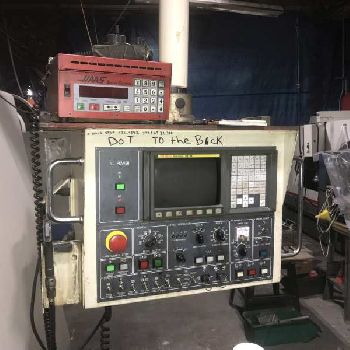 Daewoo #DMV-500, CNC VMC,24 ATC,40" X,20 Y,20 Z,CAT 40,Fanuc 21-M,turbo conveyor,S/N AV5S0594