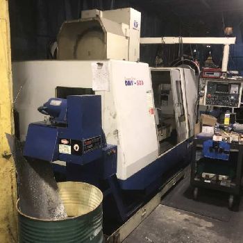 Daewoo #DMV-500, CNC VMC,24 ATC,40" X,20 Y,20 Z,CAT 40,Fanuc 21-M,turbo conveyor,S/N AV5S0594