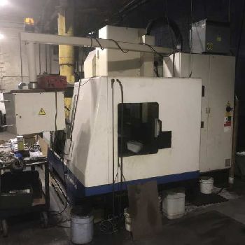 Daewoo #DMV-500, CNC VMC,24 ATC,40" X,20 Y,20 Z,CAT 40,Fanuc 21-M,turbo conveyor,S/N AV5S0594