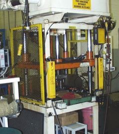 15 Ton,Metal Mechanics, 4-post hyd press,18" stroke,30 DL,30 x 29 bed,736 IPM adv,’95