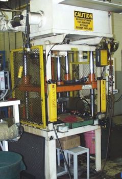 15 Ton,Metal Mechanics, 4-post hyd press,18" stroke,30 DL,30 x 29 bed,736 IPM adv,’95