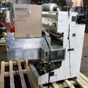 Omega #DL27, dual lane shrink bundler,13-37 bundles/minute,60-150 containers/minute,right angle infeed,#35532