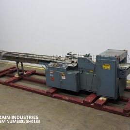 Shanklin#F5AH, horizontal flow thru shrink wrapper, 0-90 linear feet per minute, with 144" L lugged product infeed conveyor