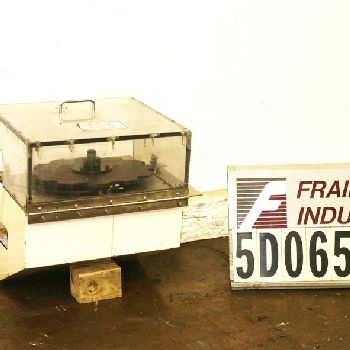 Iwka/ Oystar #CP220, automatic starwheel bottle loader capable of speeds of over 200 cartons per minute