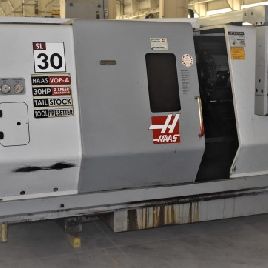 Haas#SL-30T, 3-jaw 10" chuck,12-pos.turret,2 spd.gearbox,presetter,3 spindle bore,30 HP,’03