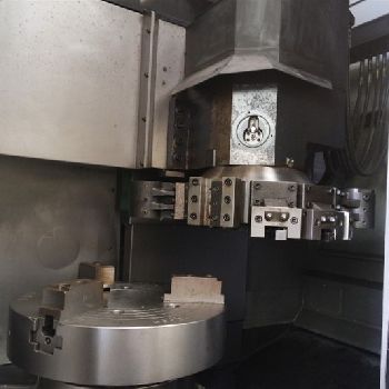 Doosan #VT-900, 39.4" swing, 3-jaw 24 chuck, 12 pos., 50 HP, 2 gearbox, Fanuc I, 2013