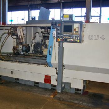 12" x 40Toyoda#GU4-100, univ hydraulic,GC-32 CNC,2 pos. head,internal wired,7.5 HP,â€™99