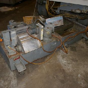 12" x 40Toyoda#GU4-100, univ hydraulic,GC-32 CNC,2 pos. head,internal wired,7.5 HP,â€™99