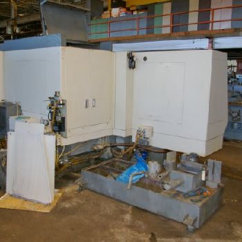 12" x 40Toyoda#GU4-100, univ hydraulic,GC-32 CNC,2 pos. head,internal wired,7.5 HP,â€™99