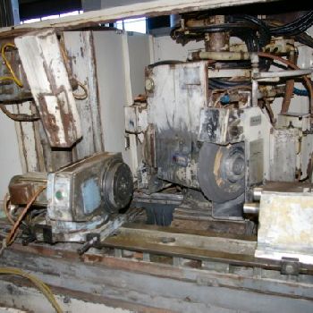 12" x 40Toyoda#GU4-100, univ hydraulic,GC-32 CNC,2 pos. head,internal wired,7.5 HP,â€™99