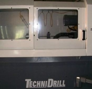 Technidrill#550-5-12-1,horiz,.500 diameter,1 spindle,15x20" T-slot table,2k rpm,Panelmate control, unused