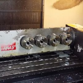 Haas#T5C4, brushless, 5-Axis, 4 5C heads, pneumatic collet closers