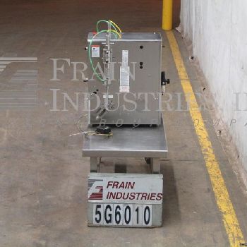 Filamatic#DAB-A-32-2, semi-automatic, 2 head table top Stainless Steel piston filler, 1-24 cycles per minute