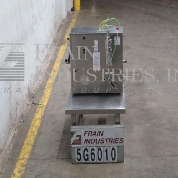 Filamatic#DAB-A-32-2, semi-automatic, 2 head table top Stainless Steel piston filler, 1-24 cycles per minute