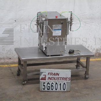 Filamatic#DAB-A-32-2, semi-automatic, 2 head table top Stainless Steel piston filler, 1-24 cycles per minute