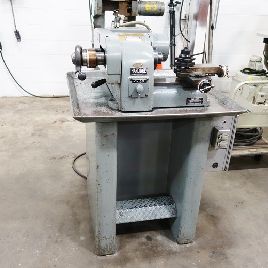 Hardinge # HSL, torno rápido, poste de herramientas de 4 vías, deslizamiento cruzado compuesto, collarín más cercano