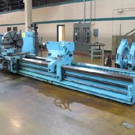 42" x 157Tos#SU100, 35HP,4 hole,in/mm,39 chuck,S/R,PF to compound,DRO,recond,’87