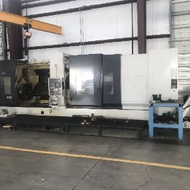 Takisawa#TG-6040, CNC turning center,160" centers,Fanuc 0iTD,31 Powerchuck,9 hole,2013