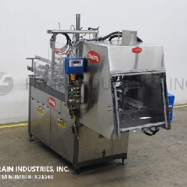 Doboy # 751, автоматический, с одной головкой, формирователь лотка, 10-60 лотков в минуту, система нанесения клея-расплава Nordson (3) и система распыления область с капюшоном