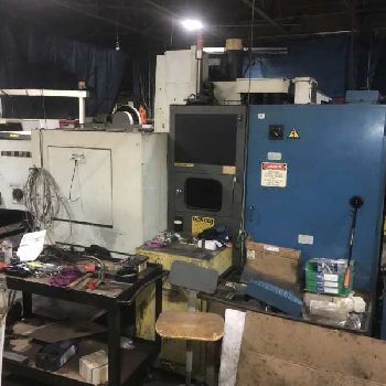 Toyoda#FV45, CNC VMC,21 ATC,32" X,18 Y,22 Z,40 x 20 T-slot table,CAT 40,Fanuc control,1986