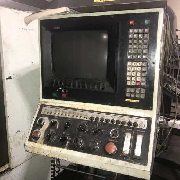 Toyoda#FV45, CNC VMC,21 ATC,32" X,18 Y,22 Z,40 x 20 T-slot table,CAT 40,Fanuc control,1986