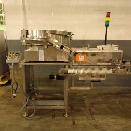 Outsetter,MGS#SPM-100, rotary outserter, to 250 cycles/min, #VBF-30 Stainless Steel bowl feeder w/timing screws on stand, 2004, #48160