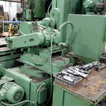 12" x 36Norton#U-4, hydraulic, 12 wheel, 5 HP spindle motor,auto feed, 4 jaw chuck, face plate, 1956