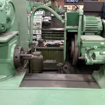 12" x 36Norton#U-4, hydraulic, 12 wheel, 5 HP spindle motor,auto feed, 4 jaw chuck, face plate, 1956