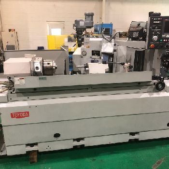 12.6" x 39.4Toyoda#GE4A-100, 11.3 diameter, 16 OD x 3 ID, #4MT, GC32 control, tailstock, 1995