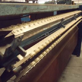 60"Rowe, 8’,drop type,rotary flipper arms,powered side tampers,end stop,side discharge