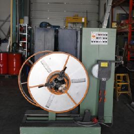 Double reel with feed