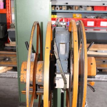 Double reel with feed