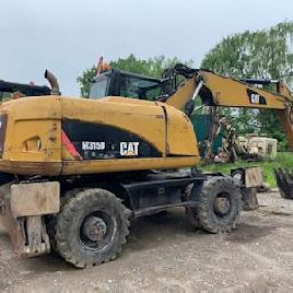 2010 Caterpillar M315D Экскаватор