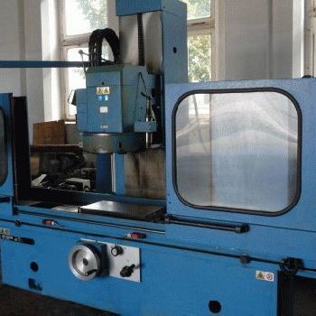 Vertical surface grinding machine